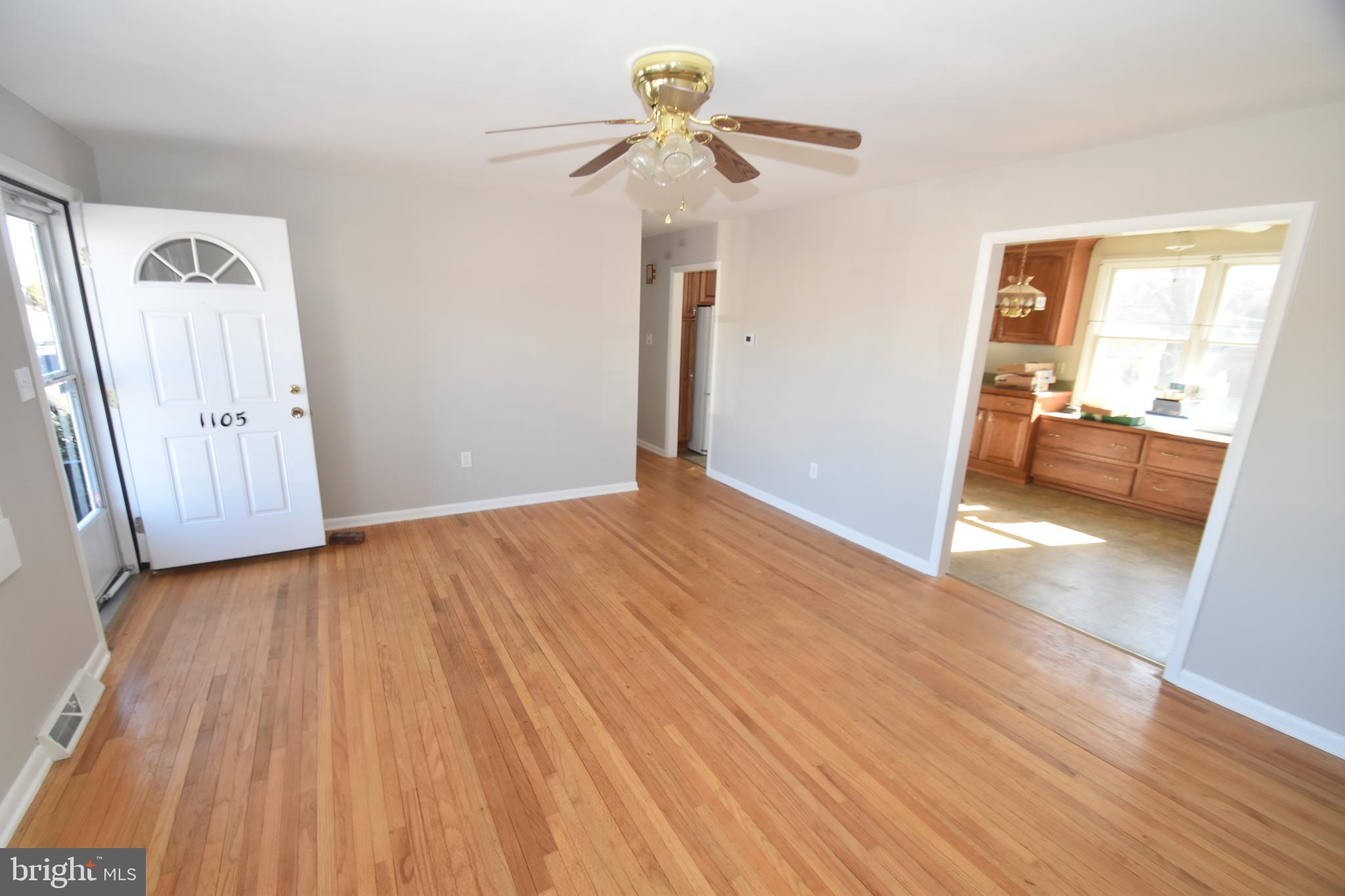 1105 Ralph Road Newark, DE 19713 - Photo 3 of 41 wooden floor in an empty room with a window