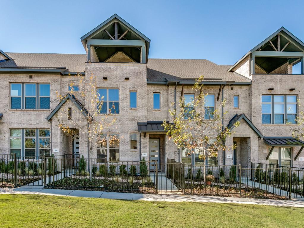 4823 Fuller Court, Unit 1003 Irving, TX 75038 - Photo 1 of 40 a front view of a house with swimming pool and glass windows