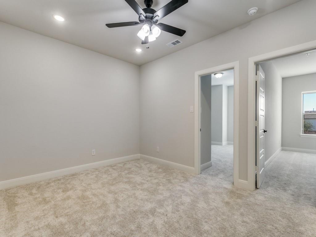 4823 Fuller Court, Unit 1003 Irving, TX 75038 - Photo 21 of 40 an empty room with a chandelier fan and closet area