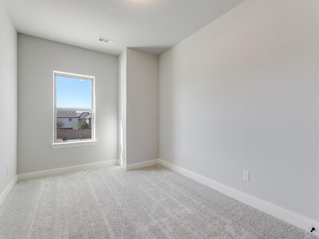 4823 Fuller Court, Unit 1003 Irving, TX 75038 - Photo 23 of 40 a view of an empty room with a window