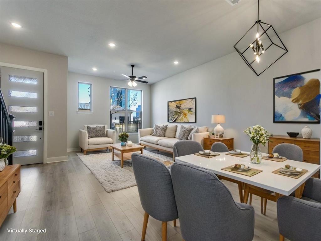 4823 Fuller Court, Unit 1003 Irving, TX 75038 - Photo 3 of 40 a living room with furniture and a flat screen tv