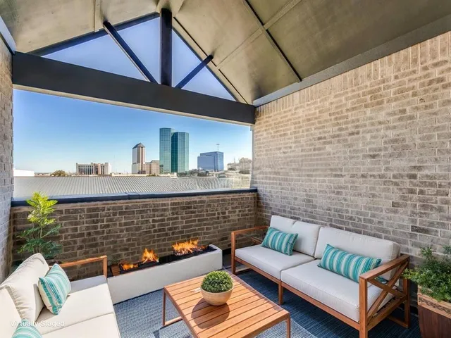 a view of outdoor seating space with furniture