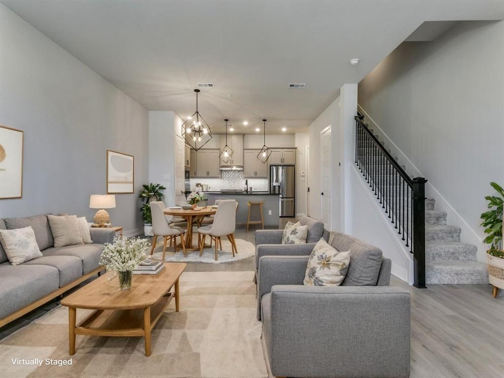 4823 Fuller Court, Unit 1003 Irving, TX 75038 - Photo 7 of 40 a living room with furniture and wooden floor