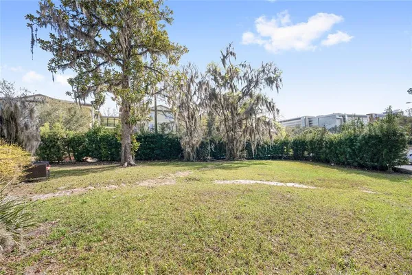 a view of a yard in front of a house