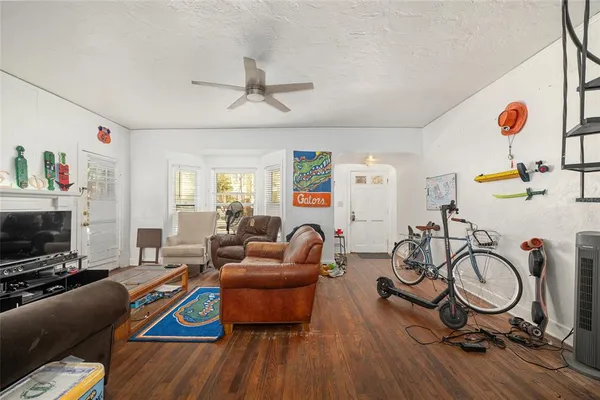a living room with furniture and a rug