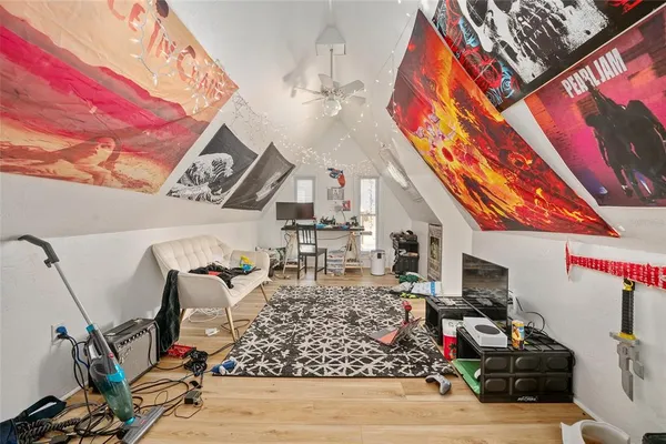 a view of balcony with wooden floor and outdoor seating