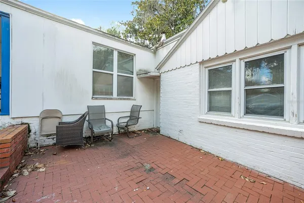 a picture of a bench in a white building