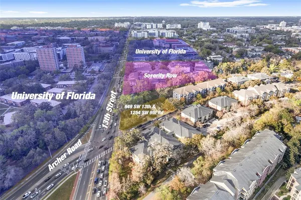 a view of a city with a building in the background