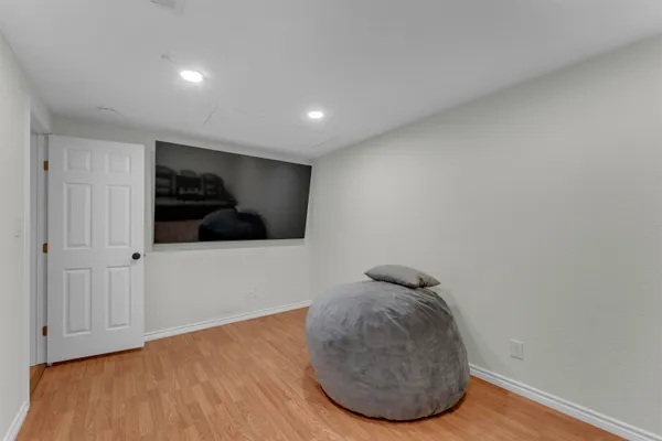 a bedroom with a bed and furniture