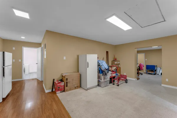 a view of livingroom with washer and dryer