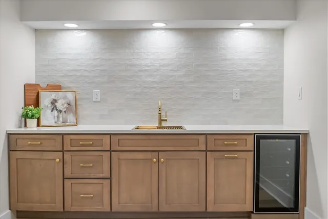 a sink with a mirror in it