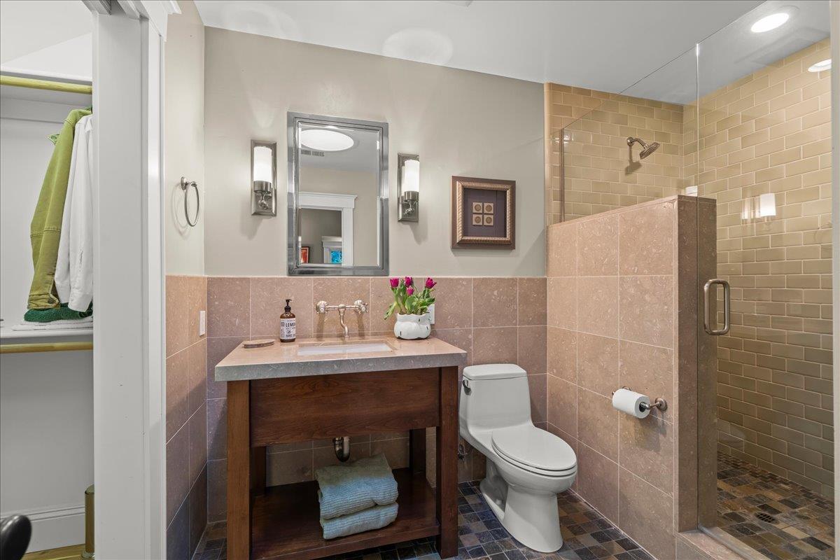 3510 Alpine Road Portola Valley, CA 94028 - Photo 31 of 77 a bathroom with a sink toilet and shower