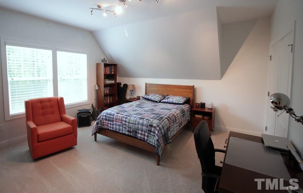 1557 Fullerton Place Raleigh, NC 27607 - Photo 8 of 25 This bedroom overlooks a nice wooded area.