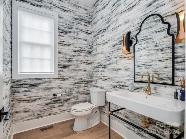 a bathroom with a sink and a toilet