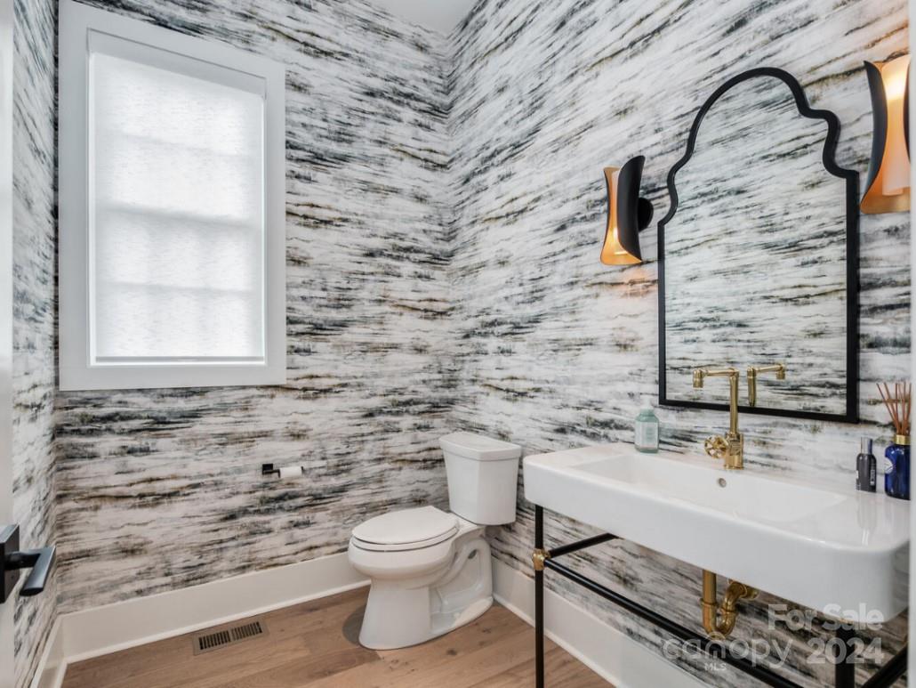 1013 Maxwell Court, Unit 4 Marvin, NC 28173 - Photo 11 of 20 a bathroom with a sink and a toilet