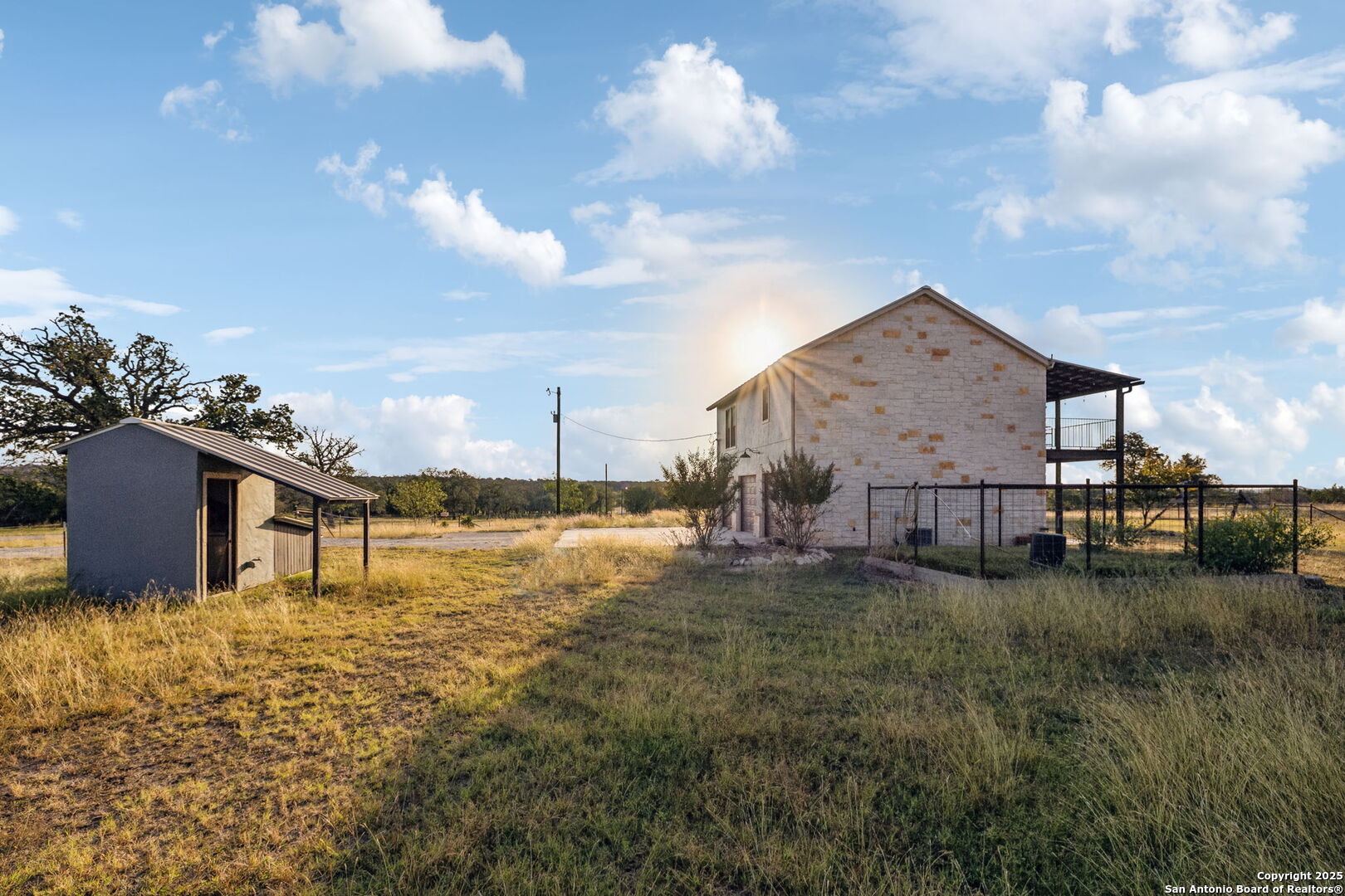 232 Stoneleigh Road Center Point, TX 78010 - Photo 21 of 34 a view of a house with a yard