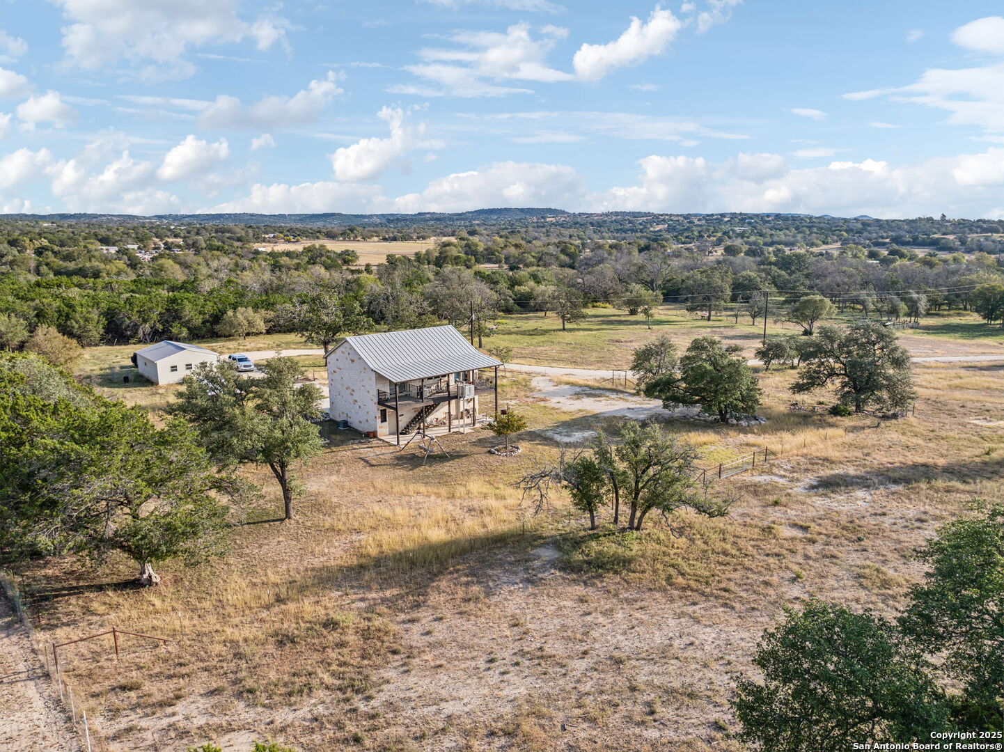 232 Stoneleigh Road Center Point, TX 78010 - Photo 22 of 34 a view of a lake with houses