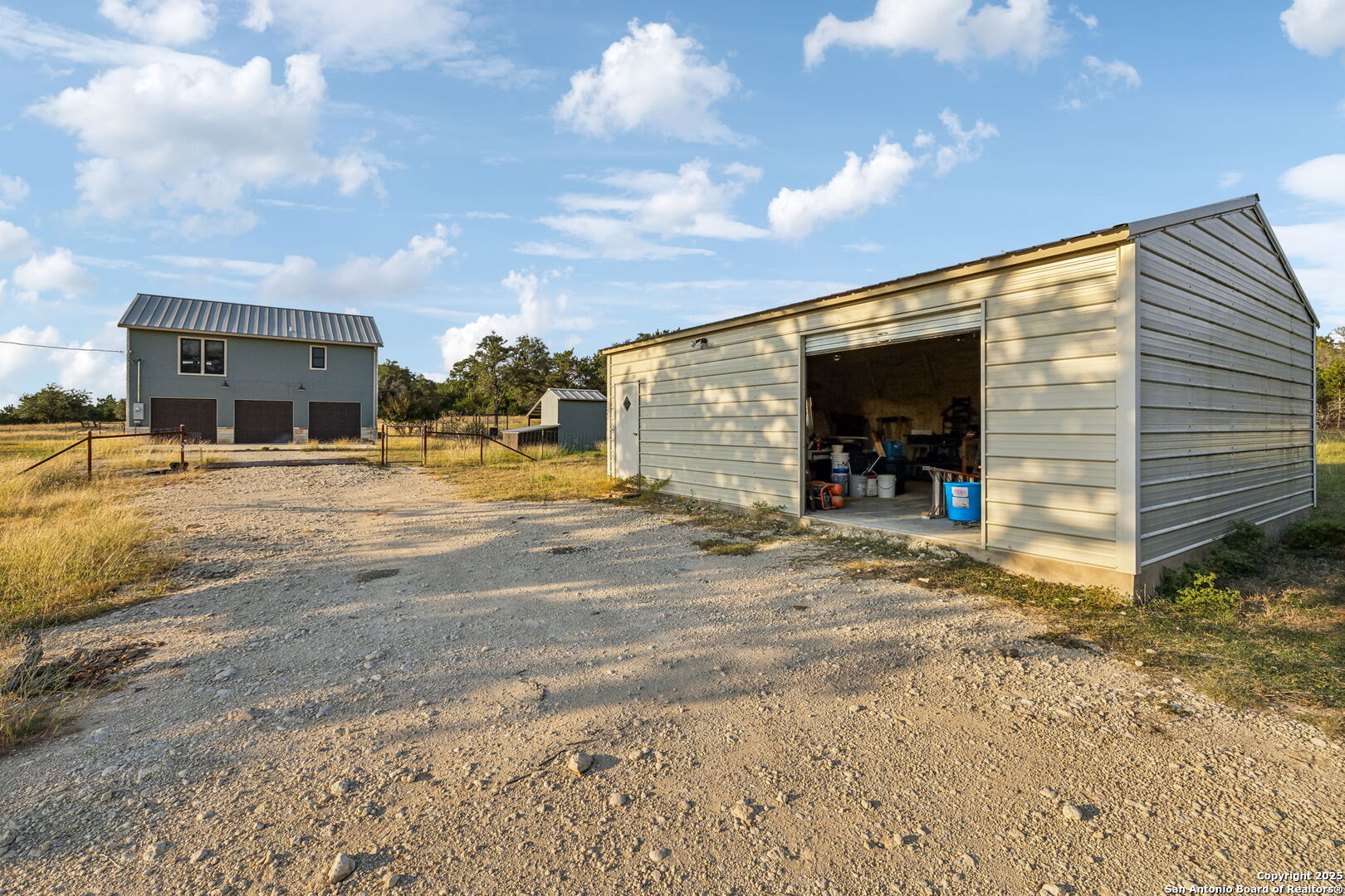 232 Stoneleigh Road Center Point, TX 78010 - Photo 23 of 34 a view of a house with a patio