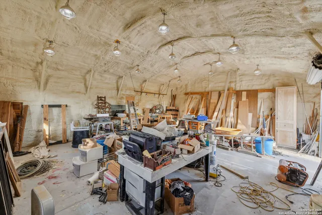 a view of a yard with large trees