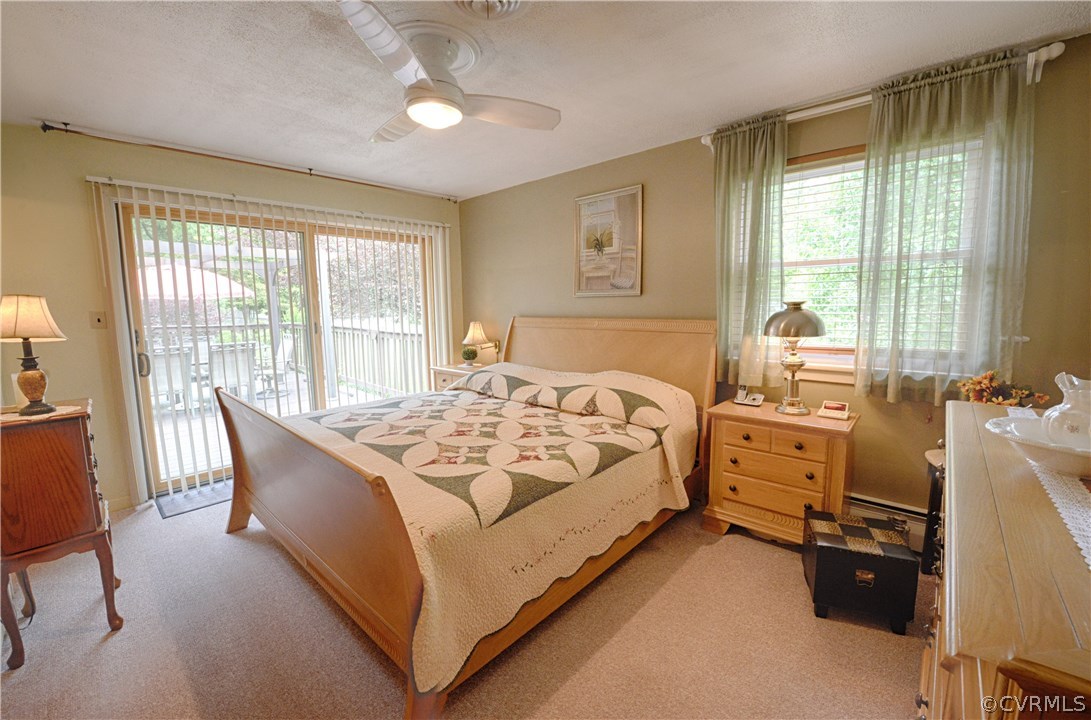 7706 Anoka Road Henrico, VA 23229 - Photo 11 of 26 15x11 master bedroom has wood floors under the car