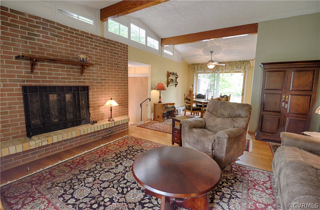 7706 Anoka Road Henrico, VA 23229 - Photo 3 of 26 Gas fireplace with floating, brick hearth.