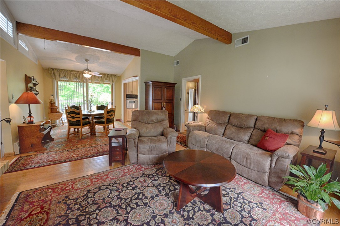 7706 Anoka Road Henrico, VA 23229 - Photo 4 of 26 Family room is open to the dining room which leads