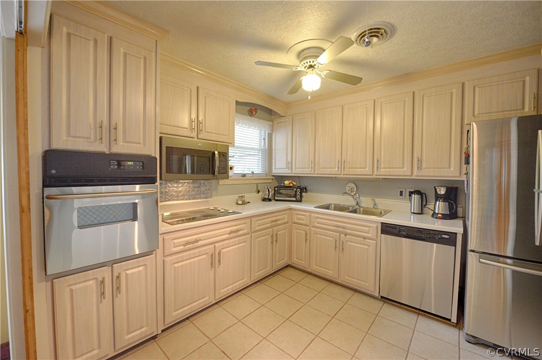 7706 Anoka Road Henrico, VA 23229 - Photo 6 of 26 Updated kitchen has tile floor, tons of cabinet sp