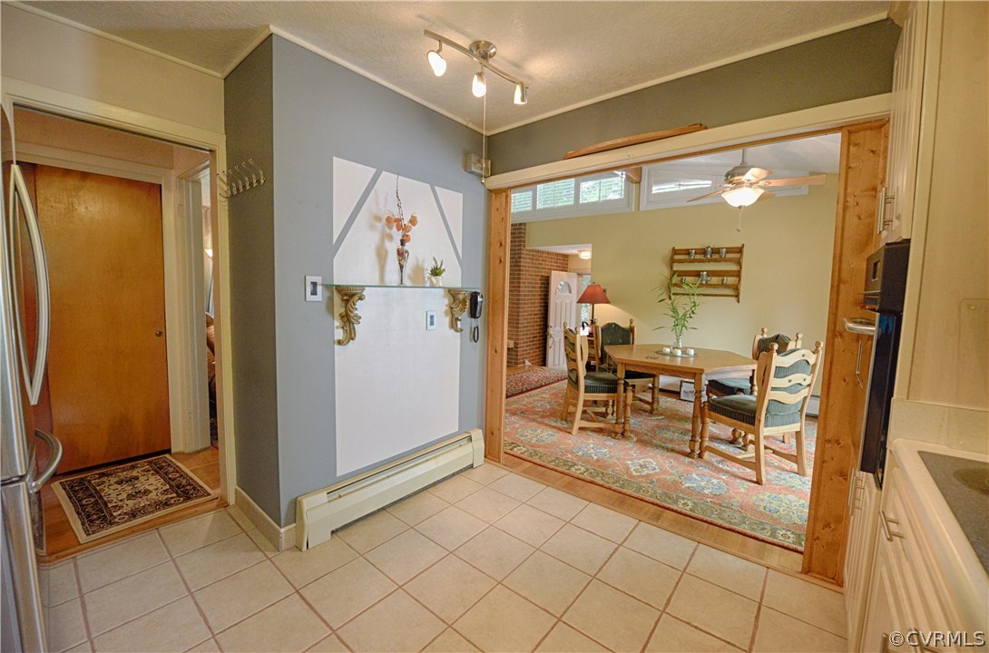 7706 Anoka Road Henrico, VA 23229 - Photo 8 of 26 Kitchen to dining area. There is a large pantry i