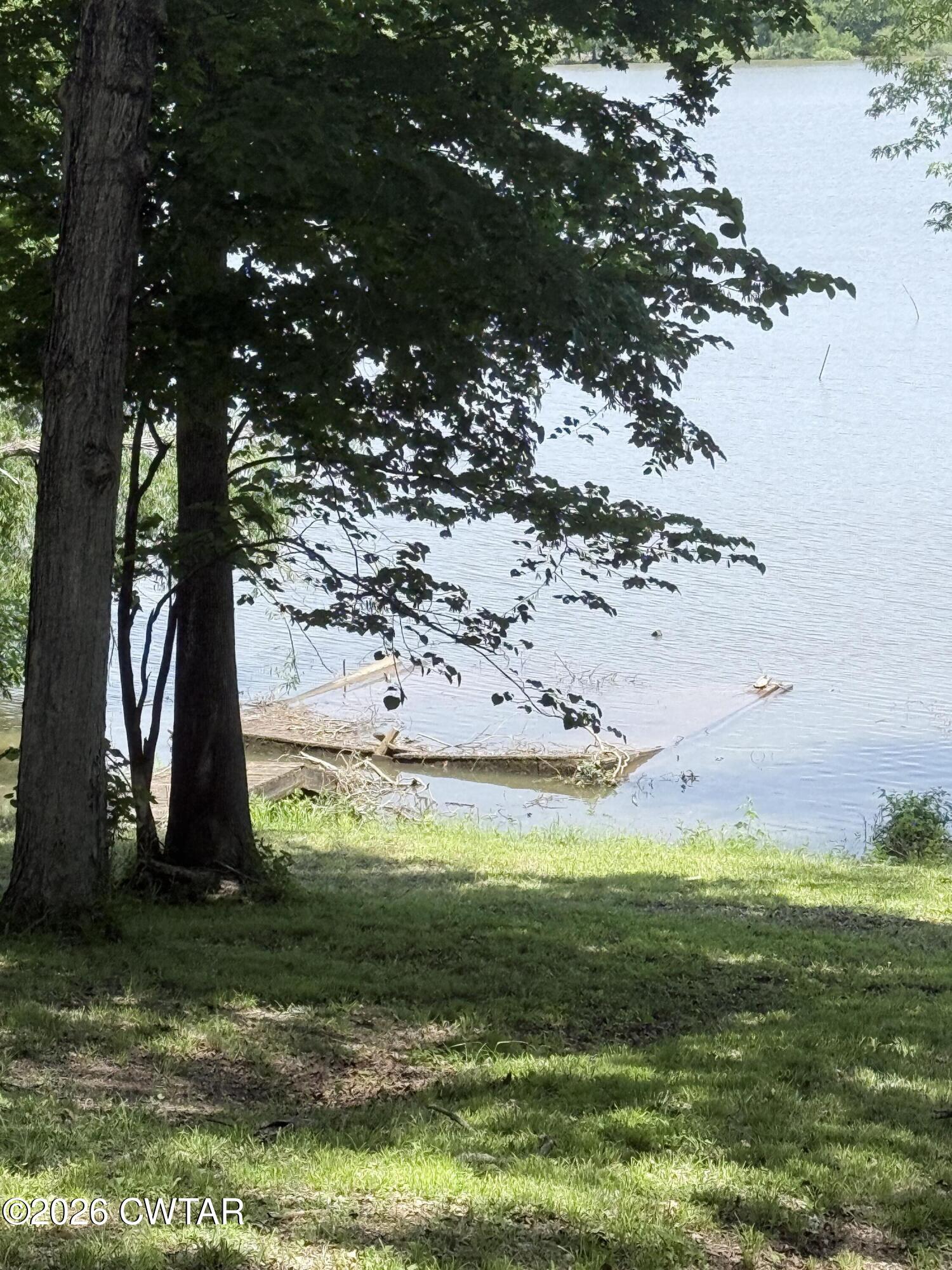 1060 Lost Creek Boat Dock Road Decaturville, TN 38329 - Photo 14 of 40 a view of a garden with an outdoor space