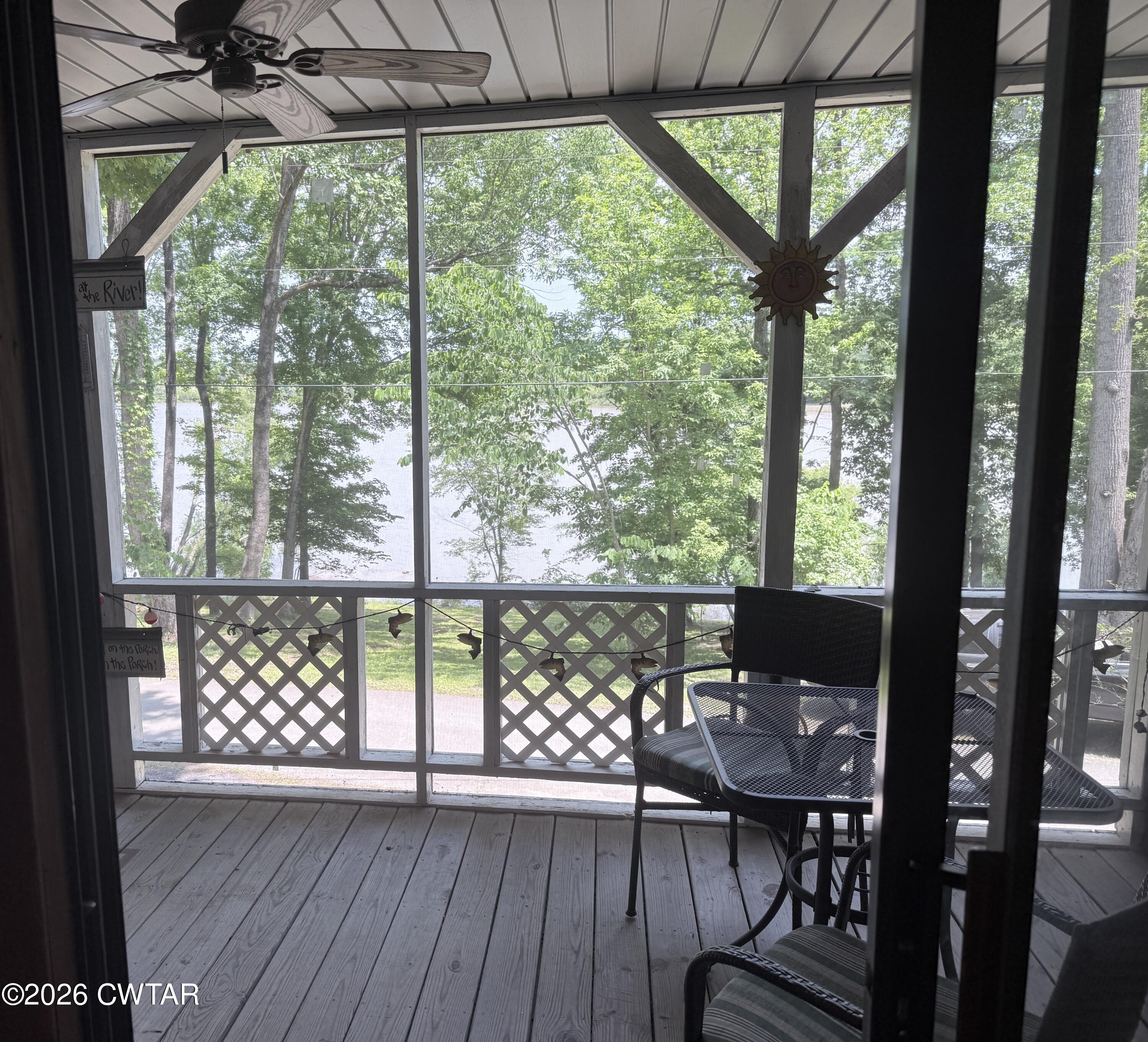 1060 Lost Creek Boat Dock Road Decaturville, TN 38329 - Photo 17 of 40 a view of a chairs in the balcony