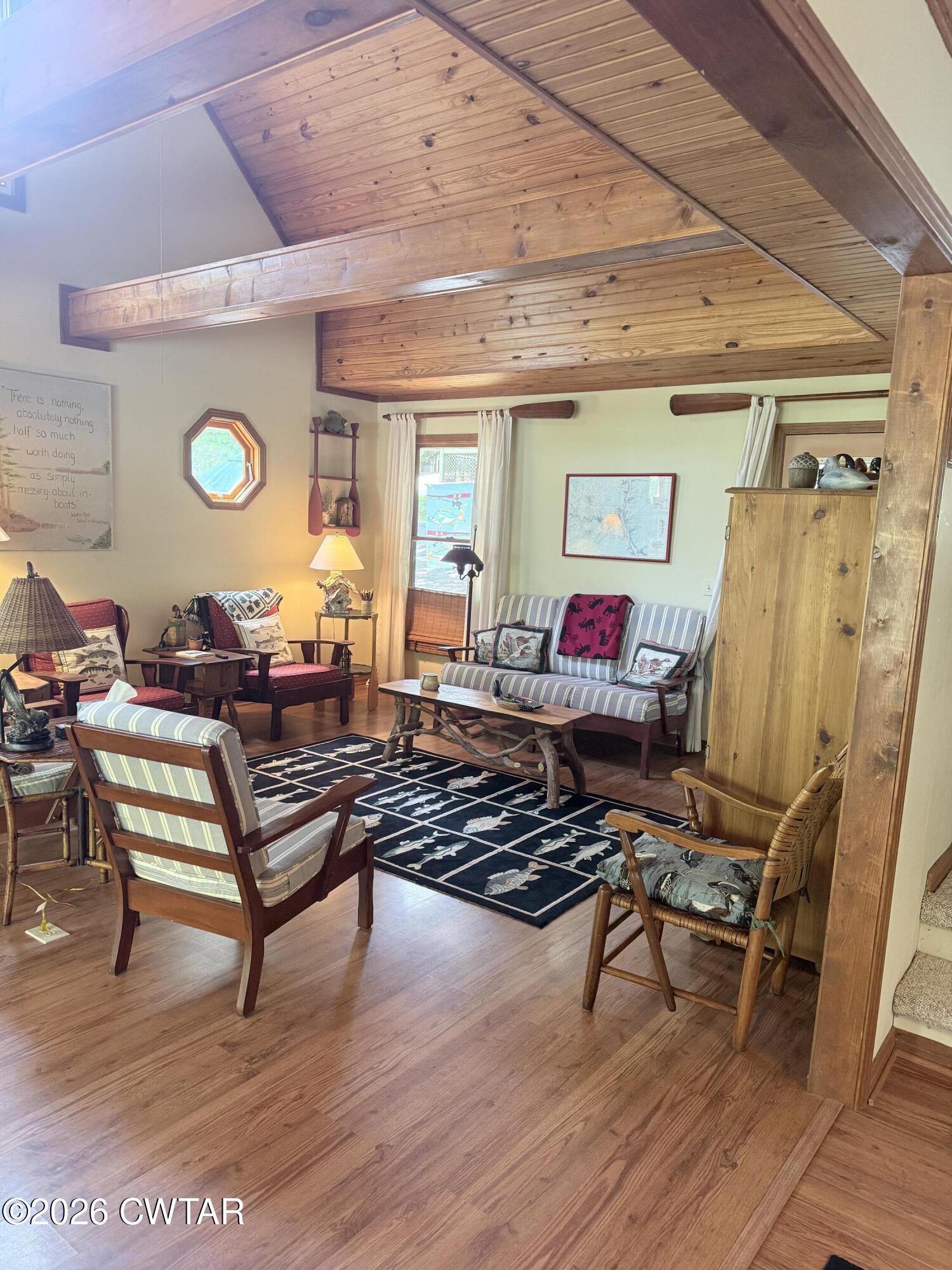 1060 Lost Creek Boat Dock Road Decaturville, TN 38329 - Photo 29 of 40 a living room with furniture and wooden floor