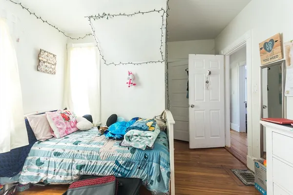 a bedroom with furniture and a bed