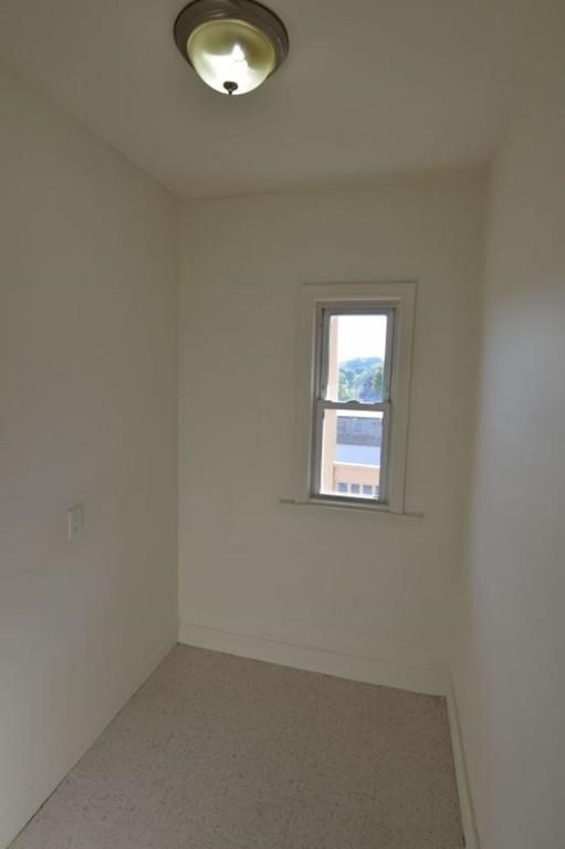 7 Topliff Street, Unit 1 Boston, MA 02122 - Photo 13 of 25 an empty room with a window
