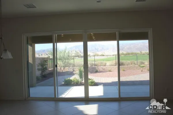 a kitchen with stainless steel appliances a sink stove and refrigerator