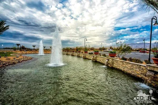 a view of a swimming pool with an outdoor space