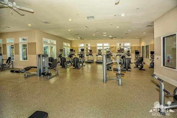 a view of swimming pool with outdoor seating