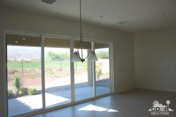 a kitchen with a stove and cabinets