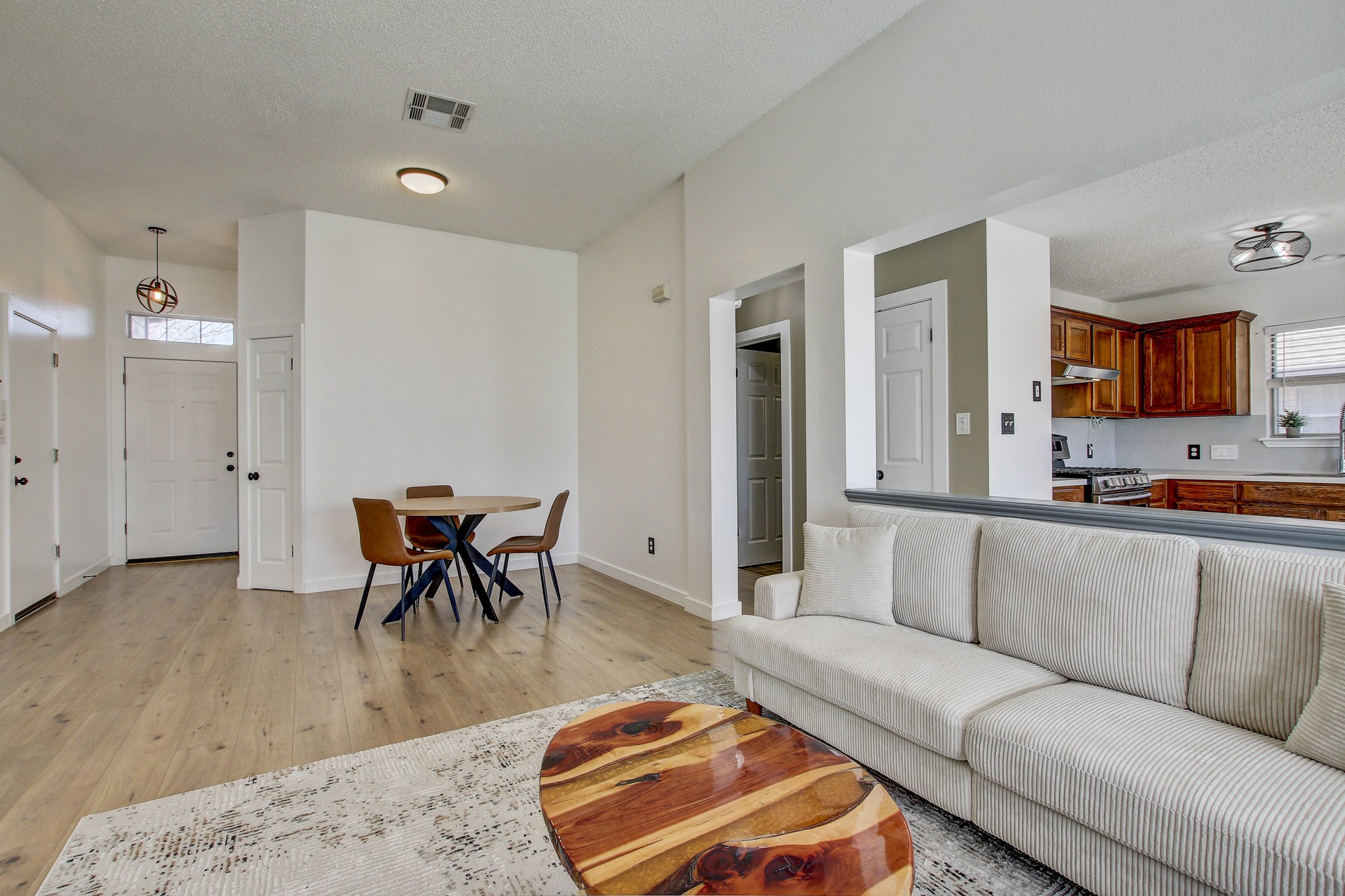 806 Ridge View Drive Leander, TX 78641 - Photo 11 of 30 a living room with furniture and a dining table