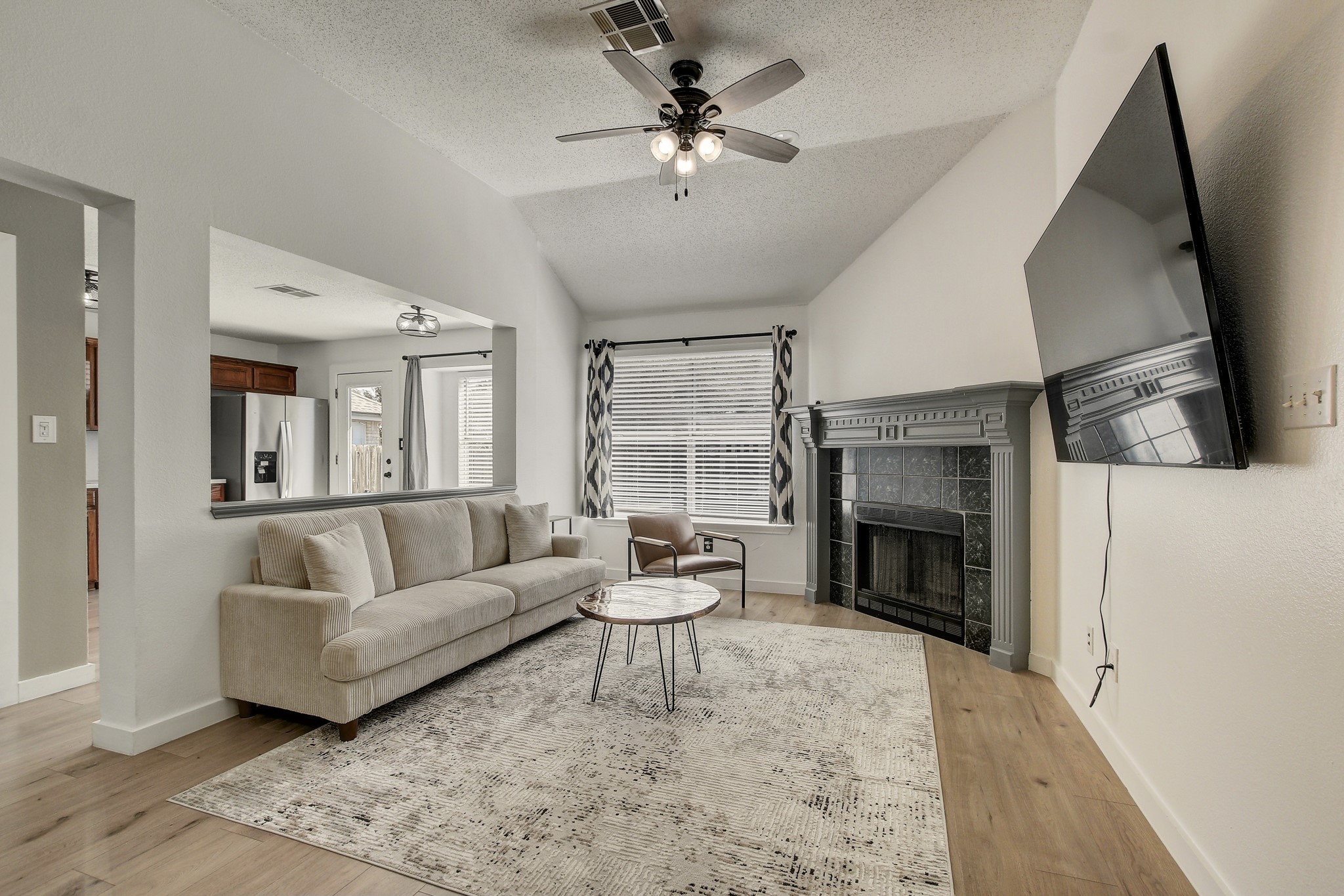 806 Ridge View Drive Leander, TX 78641 - Photo 15 of 30 a living room with furniture and a fireplace