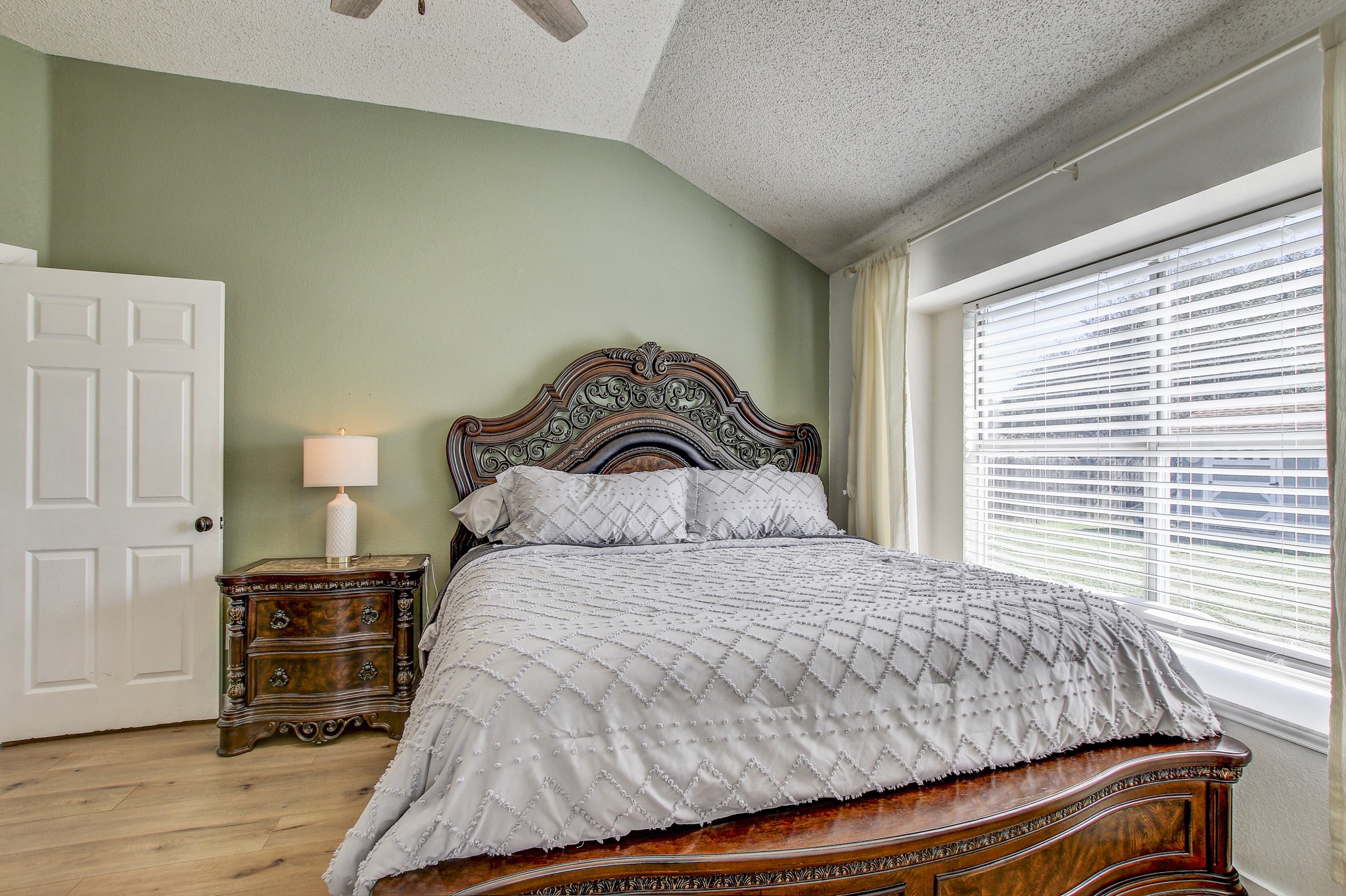 806 Ridge View Drive Leander, TX 78641 - Photo 17 of 30 a bedroom with a bed and wooden floor