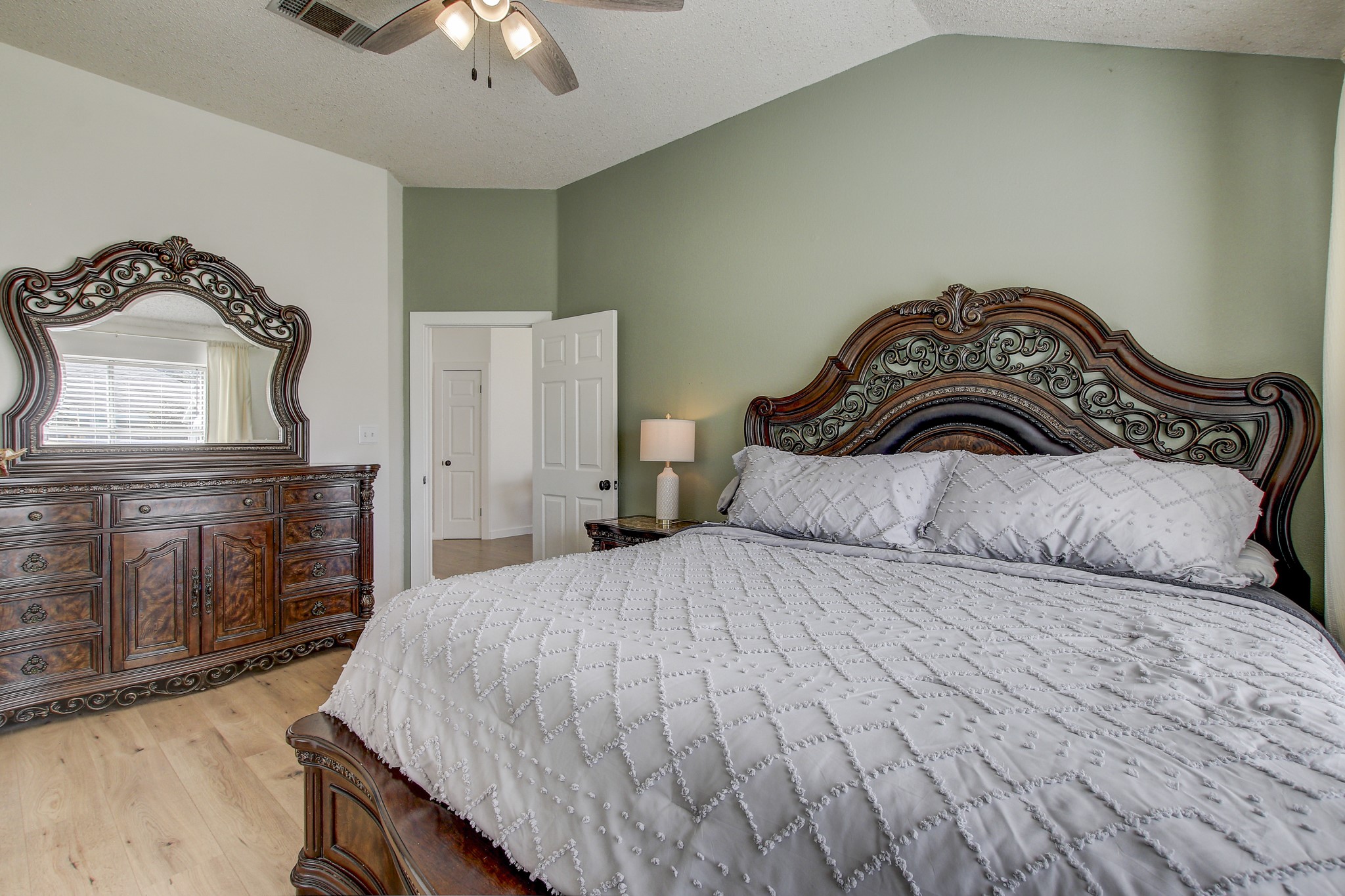 806 Ridge View Drive Leander, TX 78641 - Photo 18 of 30 a bedroom with a bed and a dresser
