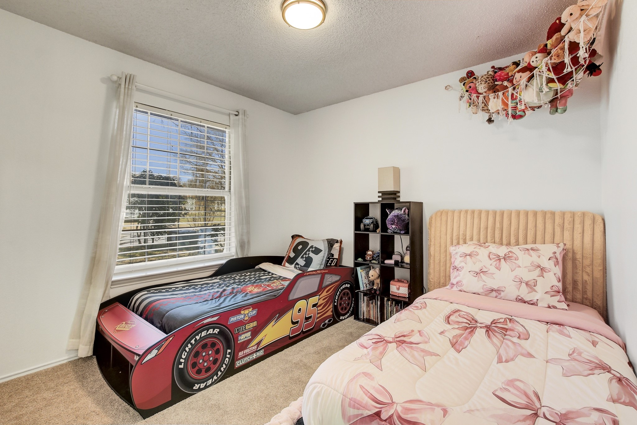 806 Ridge View Drive Leander, TX 78641 - Photo 21 of 30 a bedroom with bed and wooden floor