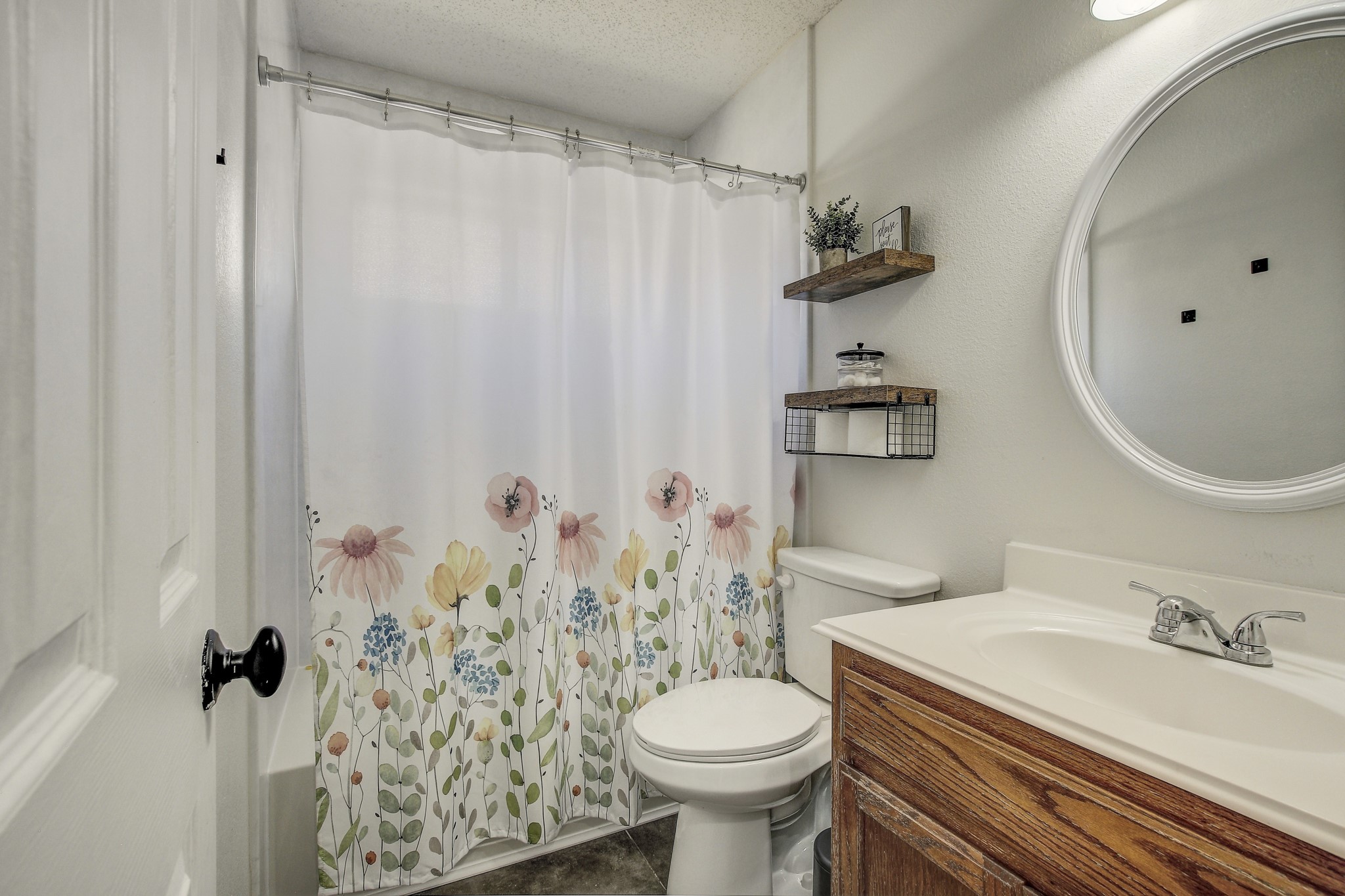 806 Ridge View Drive Leander, TX 78641 - Photo 24 of 30 a bathroom with a sink toilet and shower
