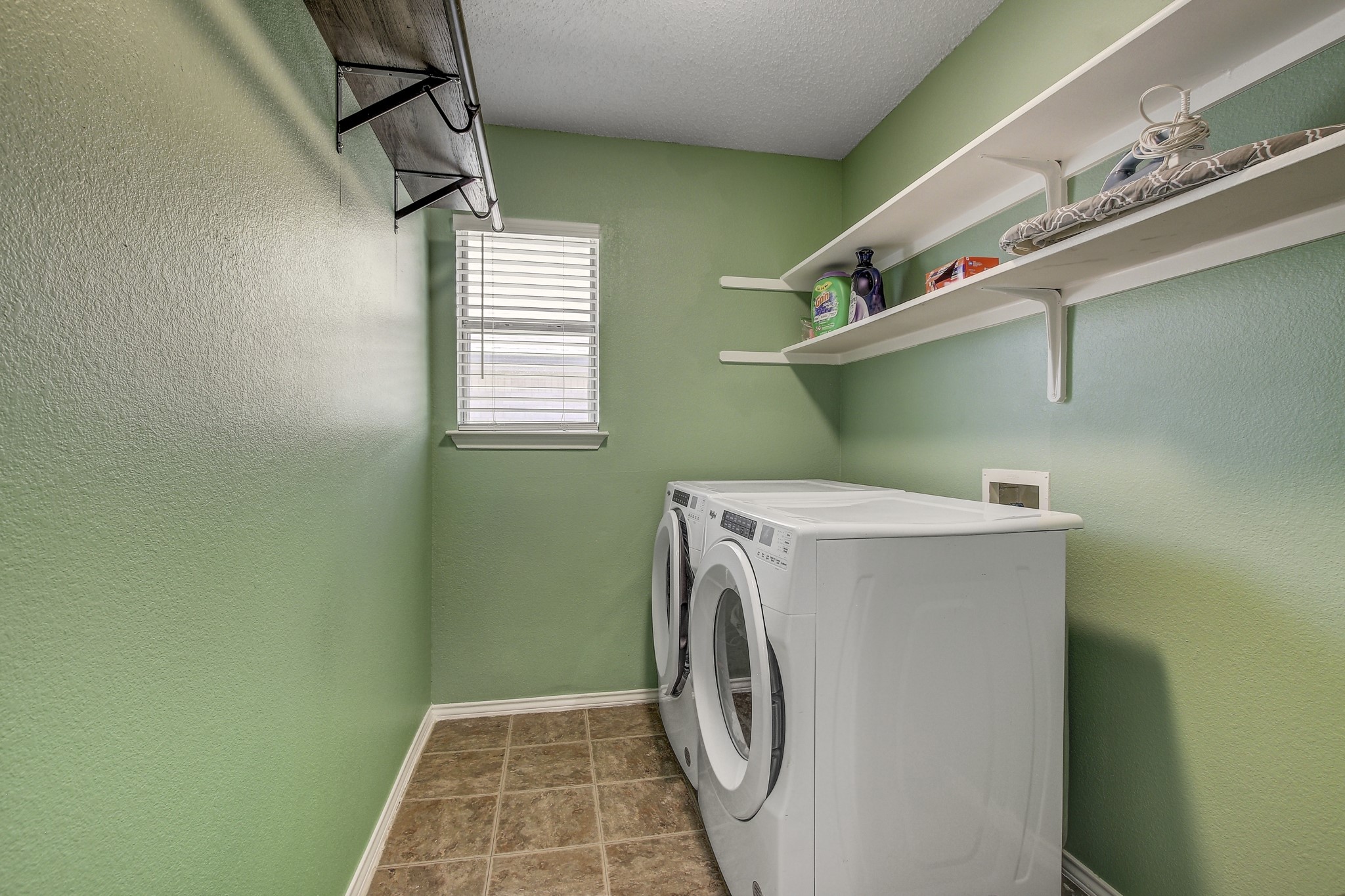 806 Ridge View Drive Leander, TX 78641 - Photo 26 of 30 a utility room with dryer and washer