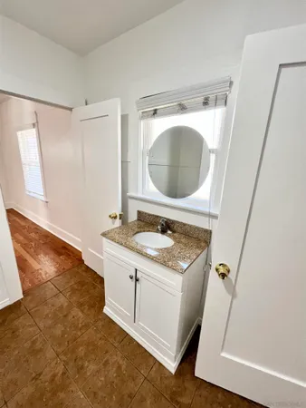 a utility room with a sink a washer and dryer
