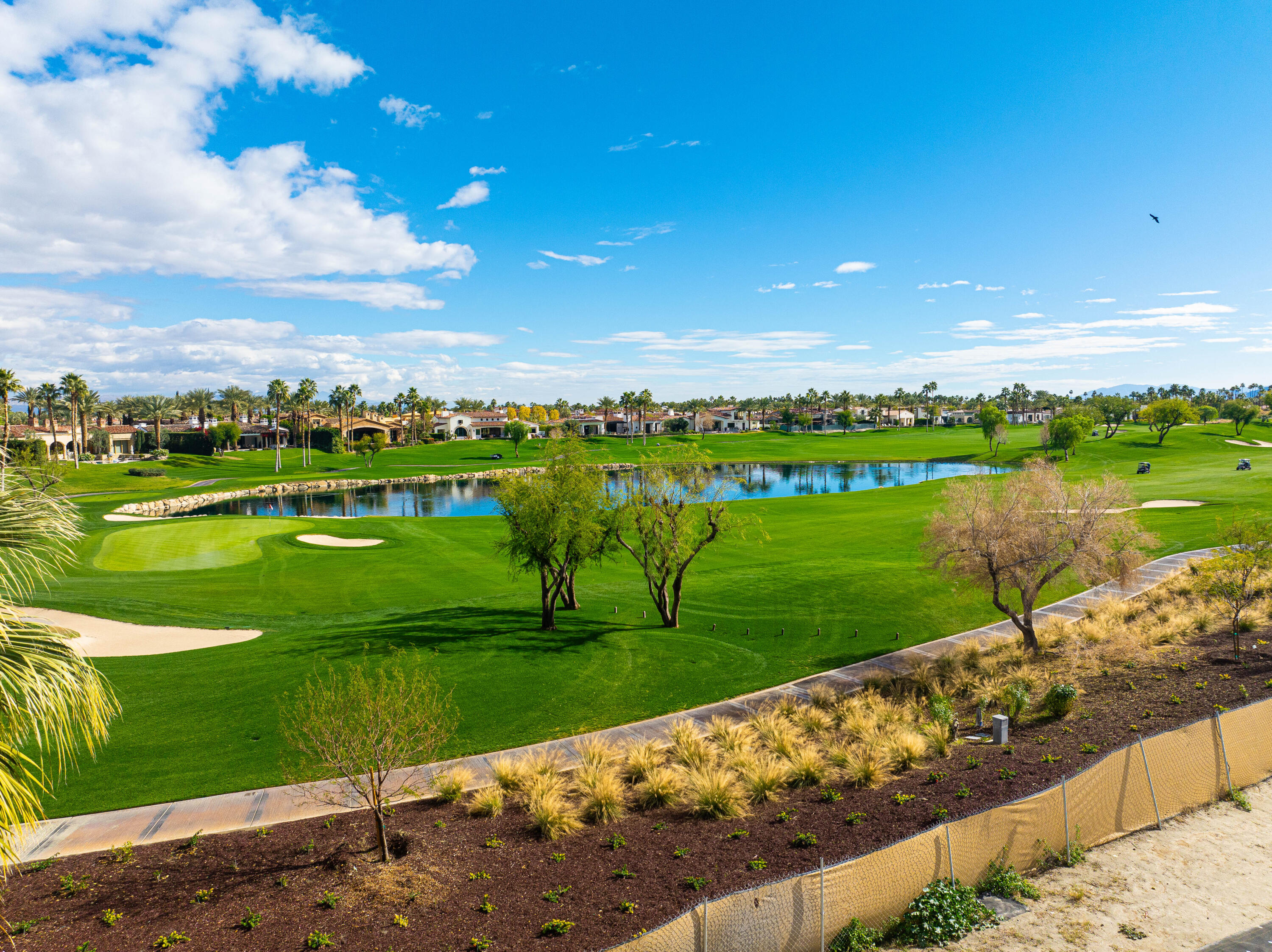 53320 Via Palacio La Quinta, CA 92253 - Photo 9 of 10 a view of a golf course with a lake