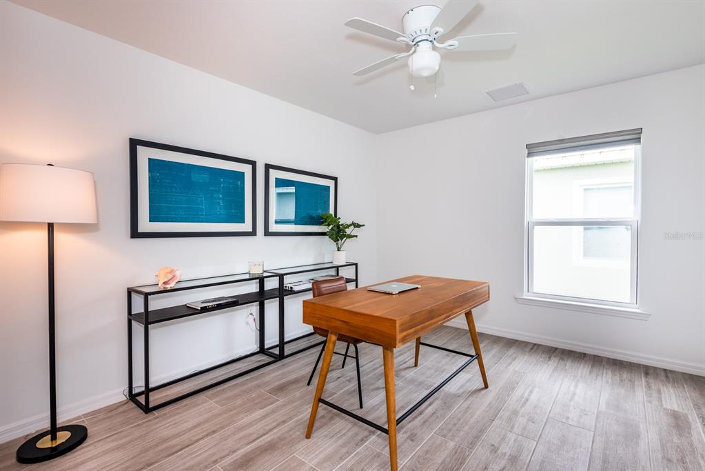 215 Lewis Circle, Unit 111 Punta Gorda, FL 33950 - Photo 24 of 43 a view of a workspace with furniture and a window