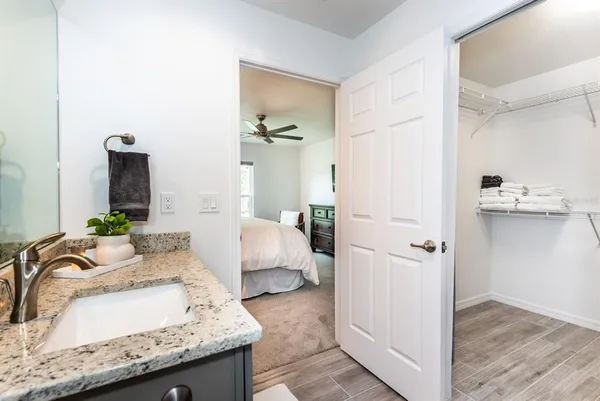 a living room with granite countertop furniture and a fireplace