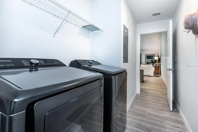 a utility room with dryer and washer