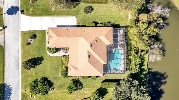 an aerial view of a house with a garden